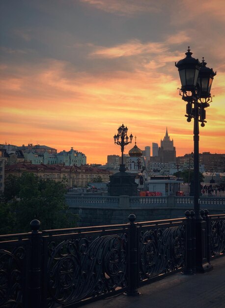 Cityscape against sky during sunset