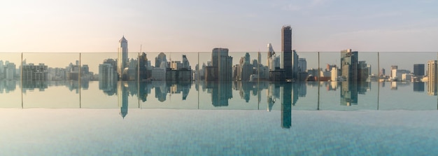 Cityscape and highrise buildings in metropolis city with water reflection