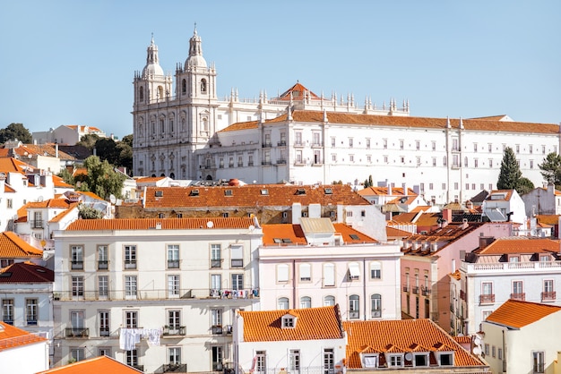 Cityscape view on the old town in Alfama district during the sunny day in Lisbon city, Portugal