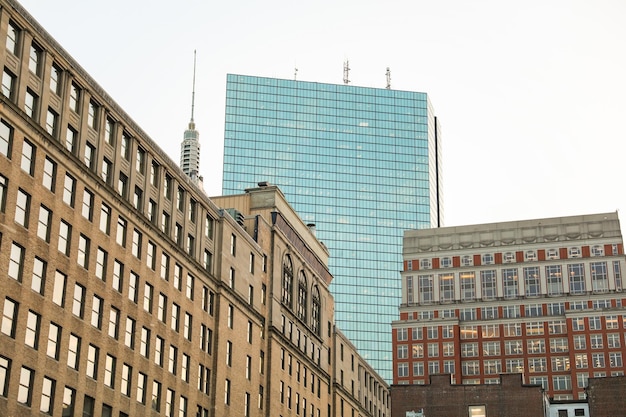 cityscape with sleek towering skyscrapers in the golden hour light representing urban growth corp