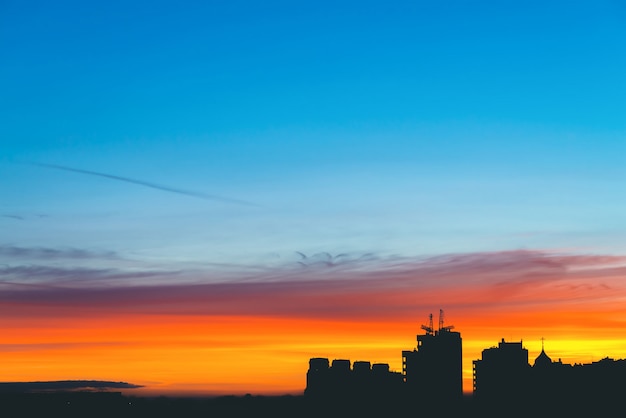 Cityscape with wonderful varicolored vivid dawn. 