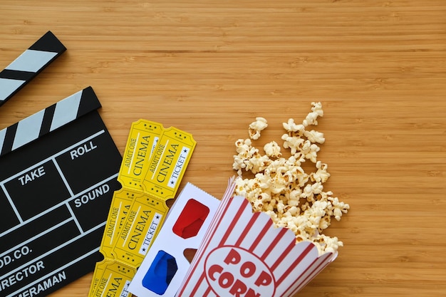 Clapper board movies tickets and popcorn