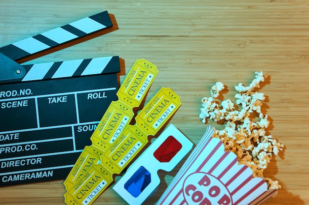 Clapper board movies tickets and popcorn