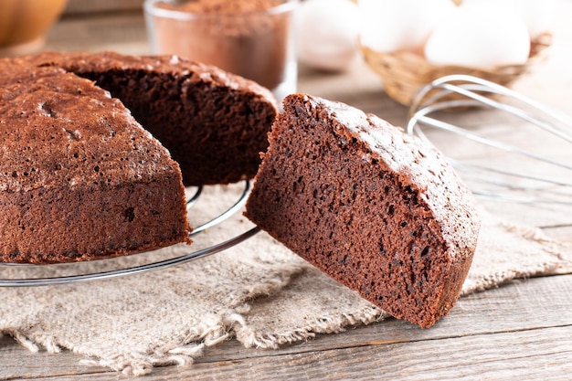 Clasic chocolate sponge cake Pan di Spagna selective focus Homemade cake