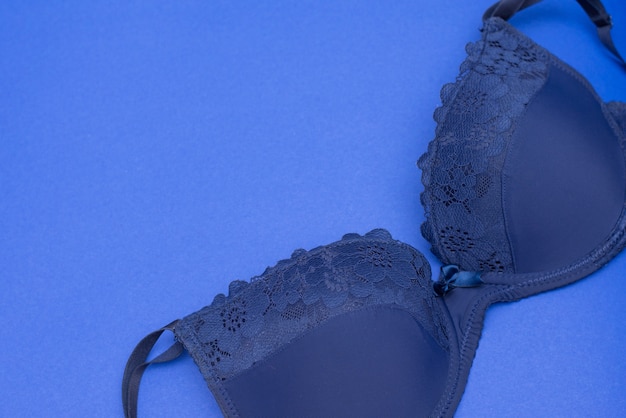 A classic blue bra close up on blue