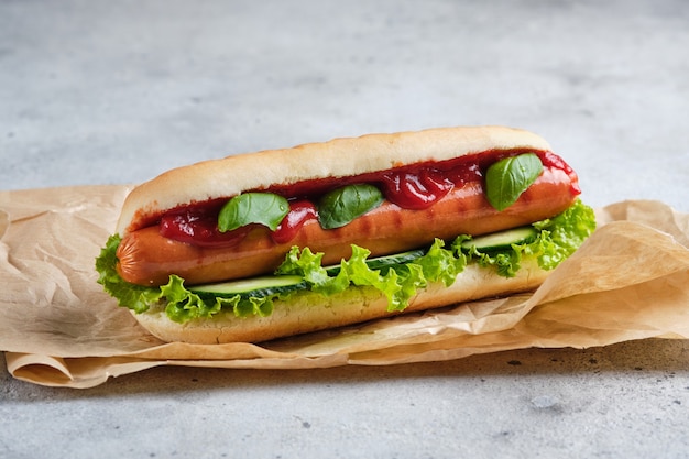 A classic hot dog on the table for a quick bite.