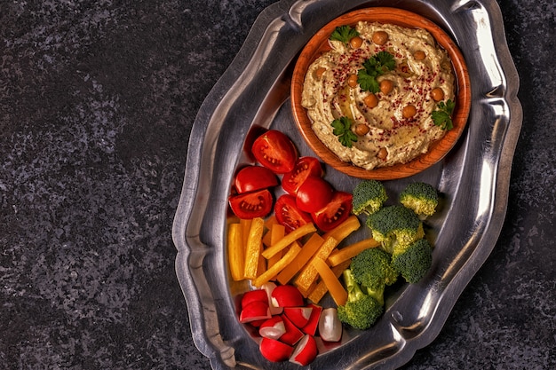 Classic hummus  on the plate.