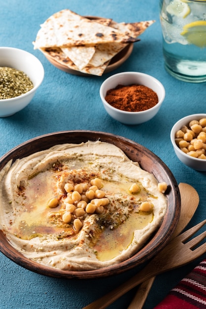 Classic hummus with chickpeas, paprika, olive oil, and oriental spices