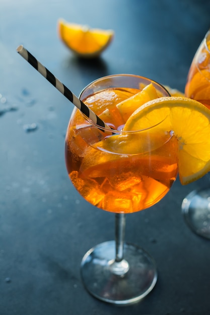 Classic italian aperol spritz cocktail on dark.