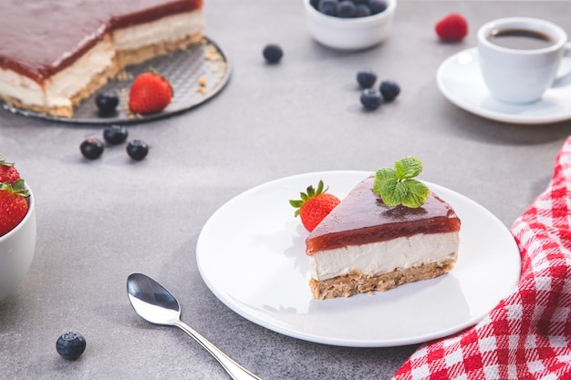 Classic New York cheesecake sliced on concrete table. Selective focus.