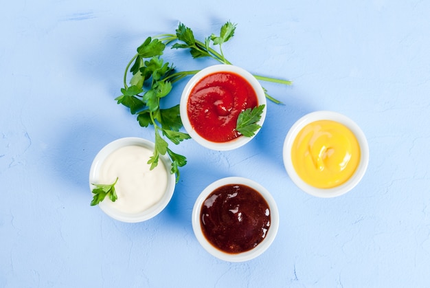 Classic set of sauces in white saucers