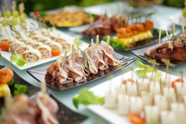 The classic Spanish hamon and catering meals on the table during the event Soft focus Diagonal view