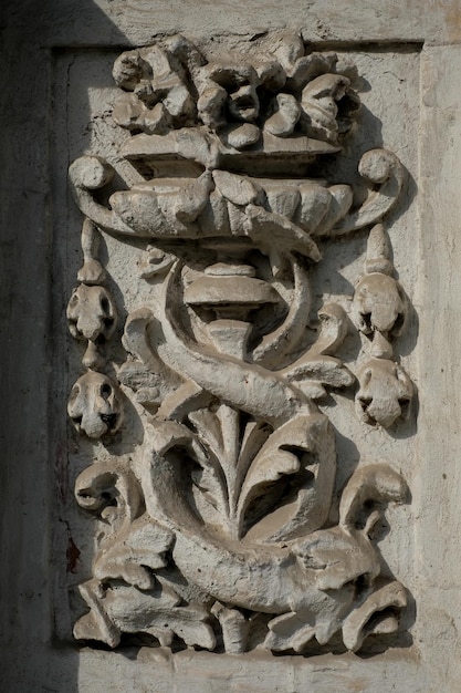 The classical facade of the old house Ancient plaster Cement wall plaster