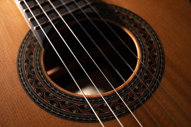 Classical guitar on black background Acoustic guitar conceptPerfect for flyer card poster or wallpaper