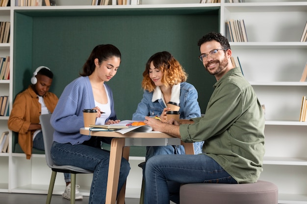 Classmates taking notes during study session