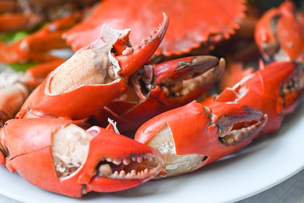 Claw crab cooking food seafood plate fresh crab on white plate boiled or steamed crab red in the restaurant food