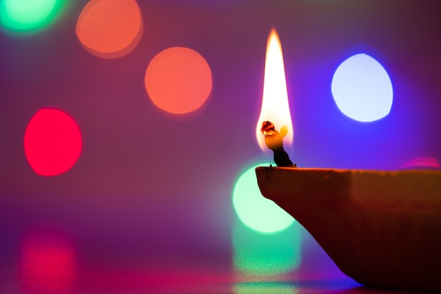  Clay Diya lamps lit during Dipavali, Hindu festival of lights celebration