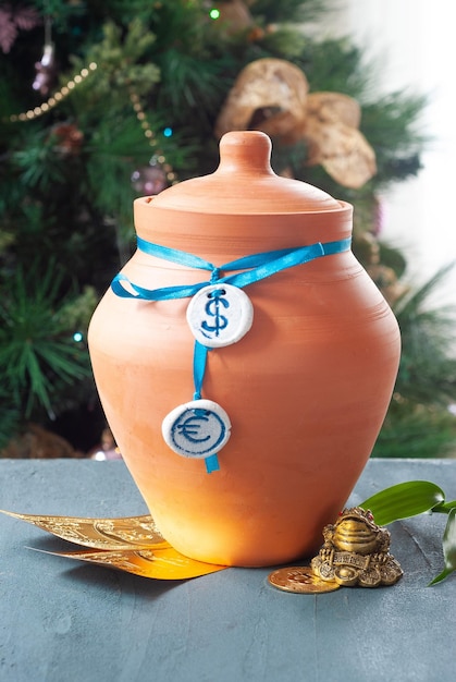 A clay pot with a dollar sign on it