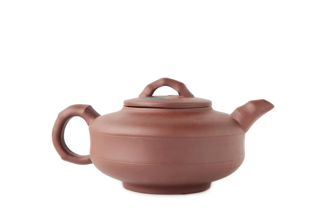 Clay teapot isolated on a white background