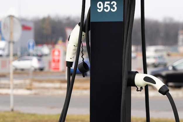 Clean energy Charging point in the parking lot Transport technologies of the futureCharging statio