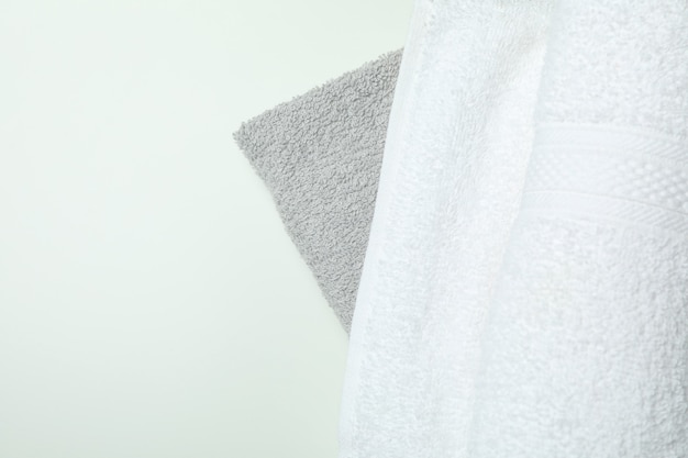 Clean folded towels on white