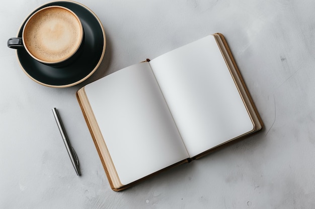 Clean Open Notebook with Coffee and Plant on White Marble for Creative Projects