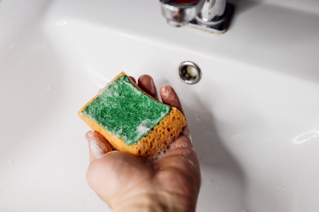 Cleaning the bathroom sink