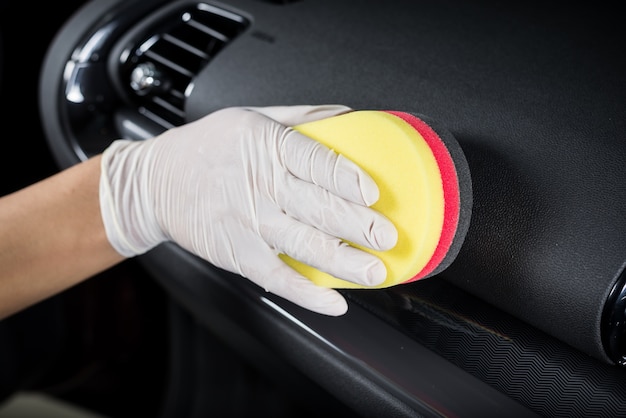 Cleaning black leather dashboard