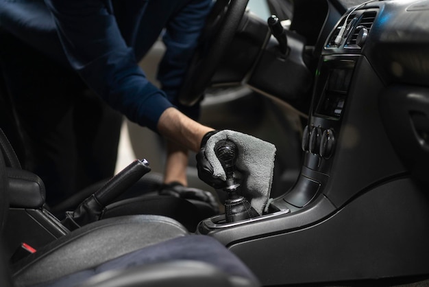 Cleaning a car interior in the studio