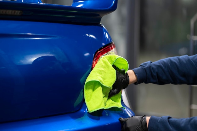 Cleaning a car LED lights with microfiber rag