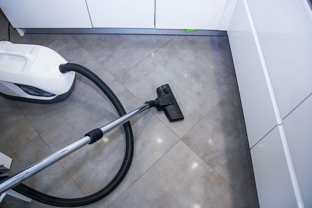 cleaning ceramic tile floors with a vacuum cleaner cleaning concept