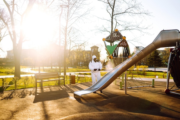 Cleaning and Disinfection playground with spray chemicals to preventing the spread of of coronavirus