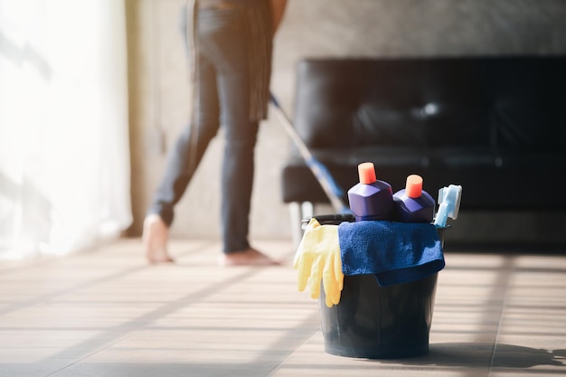 The cleaning equipment bins of the cleaners are placed on the floor Concept of cleanliness in the organization