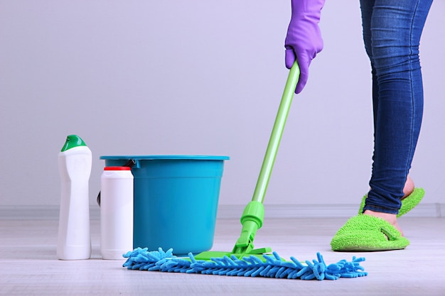 Cleaning floor in room close-up