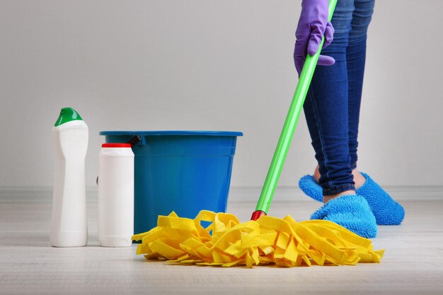 Cleaning floor in room closeup