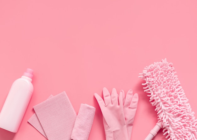 Cleaning kit in the house pink on a pink background.