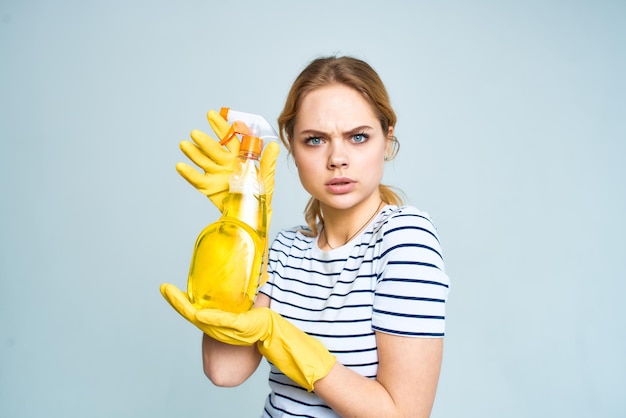 Cleaning lady in rubber gloves housewife detergent