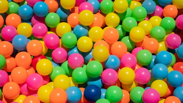 Cleaning of multicolored plastic balls by washing the water and exposing to the sun