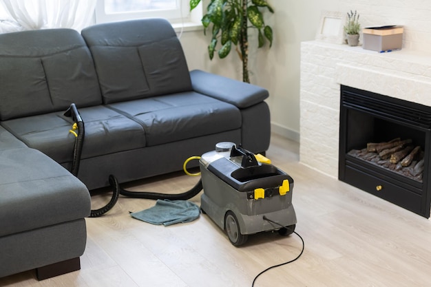 Cleaning Sofa With Vacuum Cleaner.