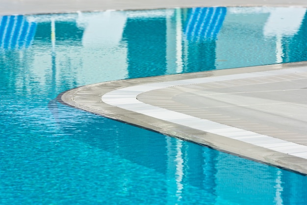 Clear blue bright water in the swimming pool