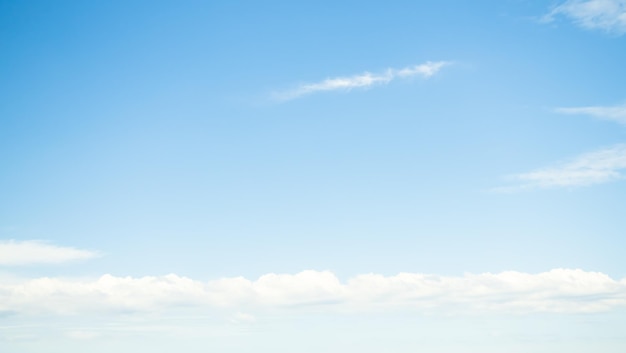 A clear blue sky with a cloud