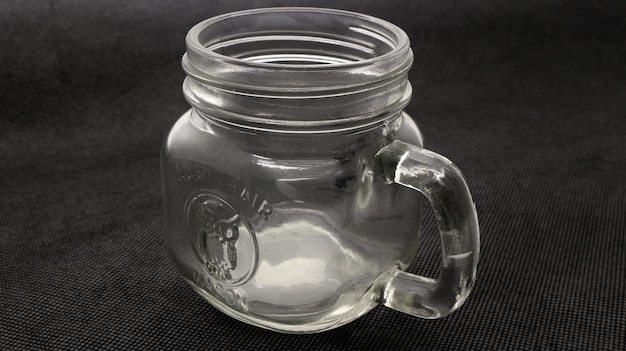 Photo clear glass cup with handle and glass cover