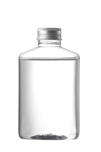 Clear plastic bottle with liquid on white background