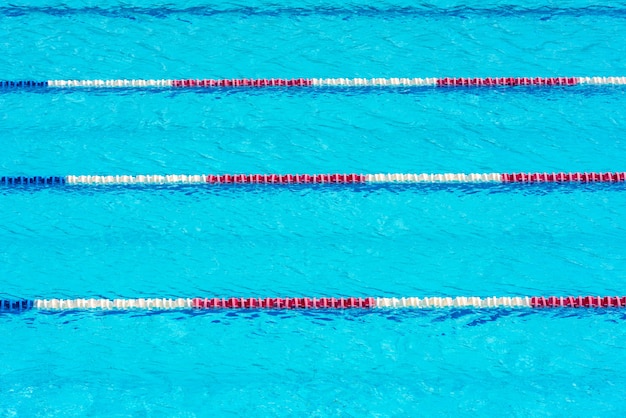 Clear transparent swimming pool water background. Horizontal shot