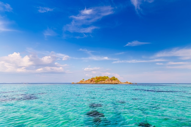 Clear water and beautiful sky at the paradise island in the tropical sea of Thailand