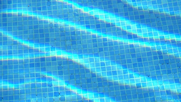 Clear water with ripples in tiled pool