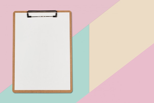 Clipboard with white sheet on pastel color background, Minimal concept