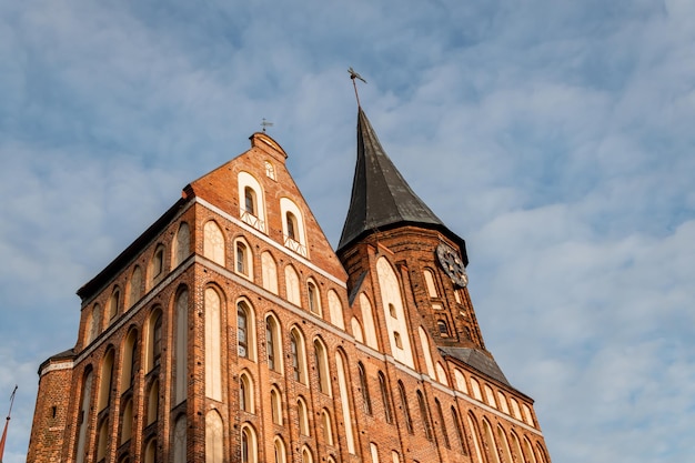 Clock on the Cathedral Ostrov Kant Kaliningrad large medieval cathedral German Russian architecture Christianity Catholicism tourism in russia kaliningrad region