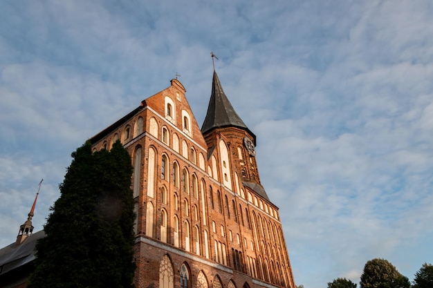 Clock on the Cathedral Ostrov Kant Kaliningrad large medieval cathedral German Russian architecture Christianity Catholicism tourism in russia kaliningrad region