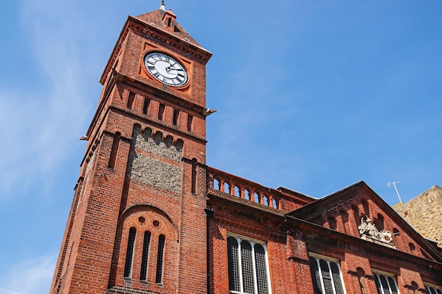 Clock tower at Brighton Pier in East Sussex in the UK. It is also called Brighton Marine Palace and Pier, or Palace Pier.